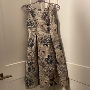 I am selling a pearl grey blue dress size 2